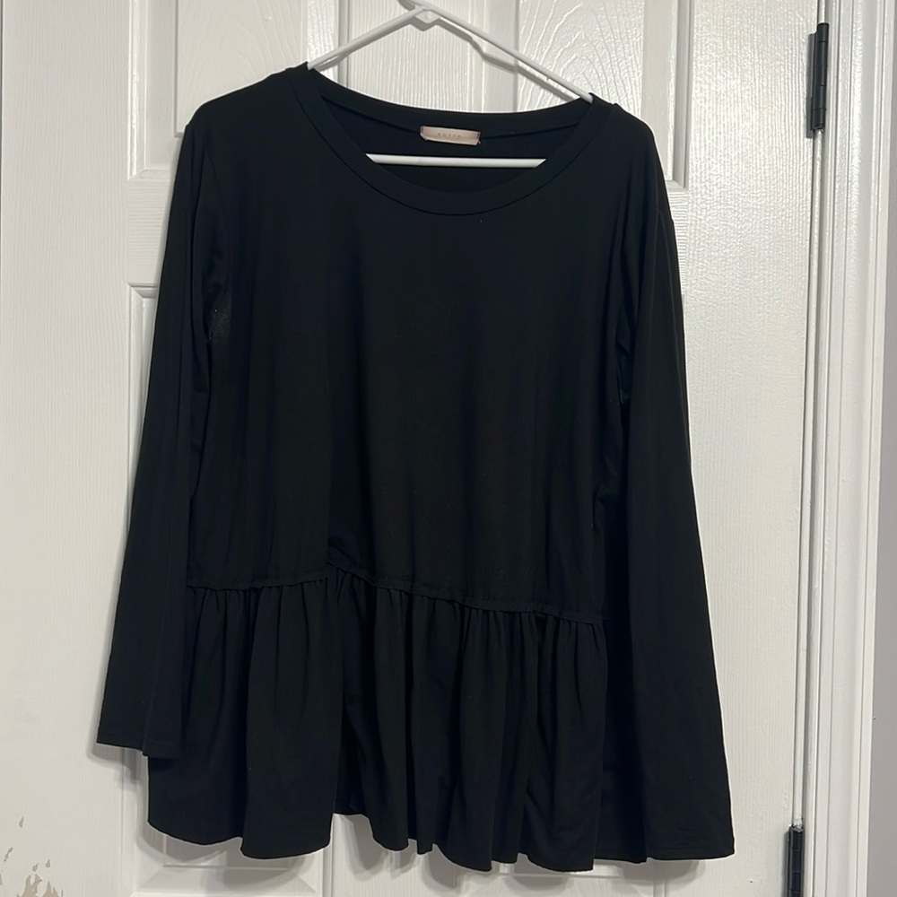 Boutique | black long sleeve entro Peplum Top